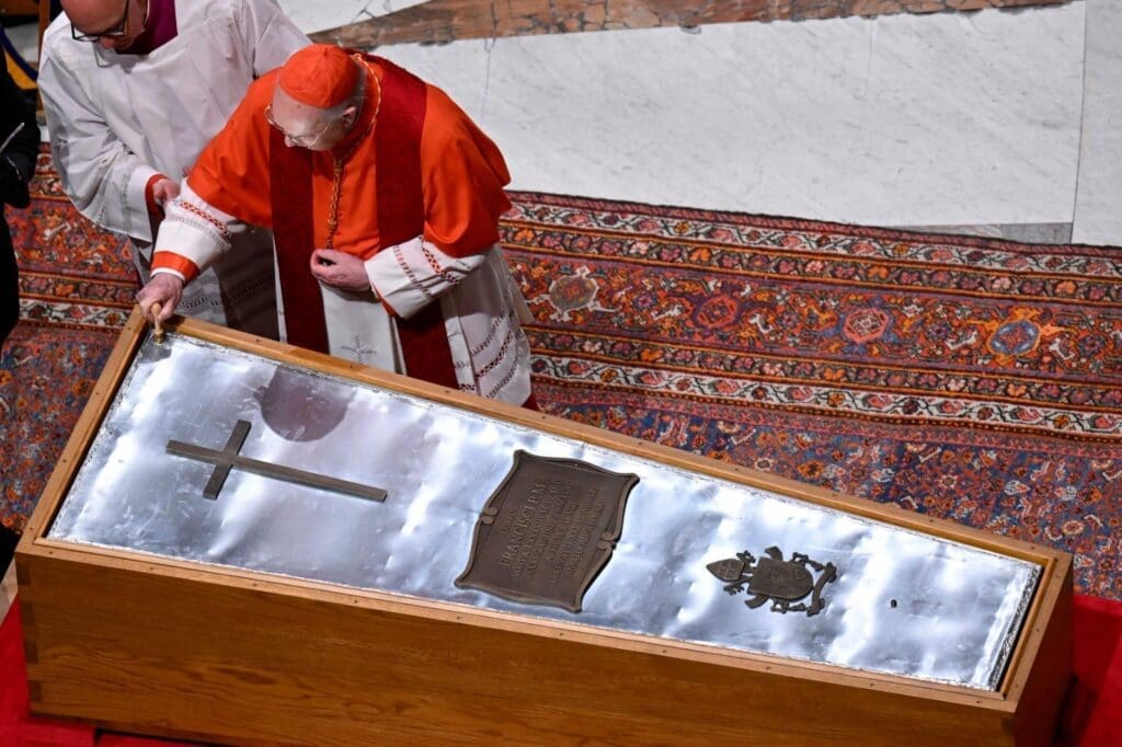 Cardinal Kevin Farrell (the current Camerlengo) affixes his Seal to Pope Francis' Coffin