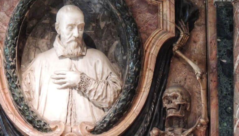 Close up of the details of a skeleton in the funeral monument of Mariano Pietro Vecchi in San Pietro in Vincoli Rome