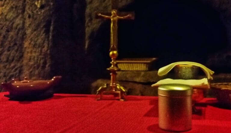 Altar set for mass inside one of the cubicula of the catacombs of Domitilla in Rome