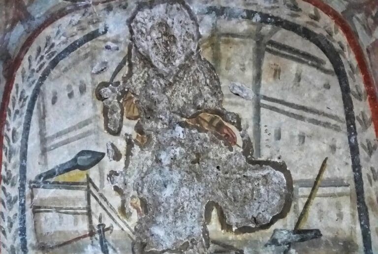 Damaged ceiling fresco in a cubiculum of the catacombs of domitilla in Rome