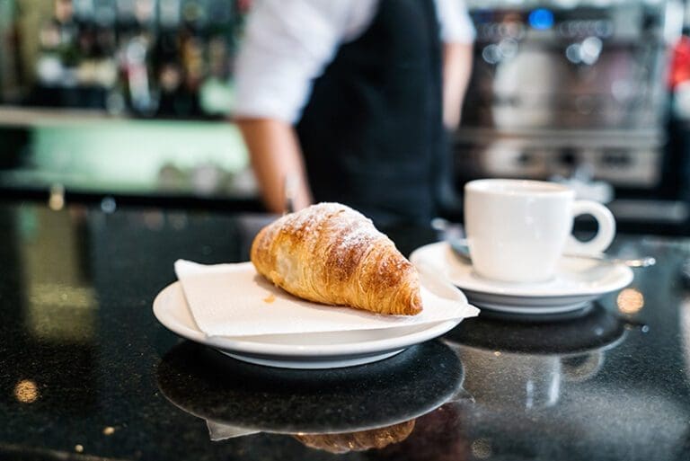 breakfast in rome means cappuccino and cornetto