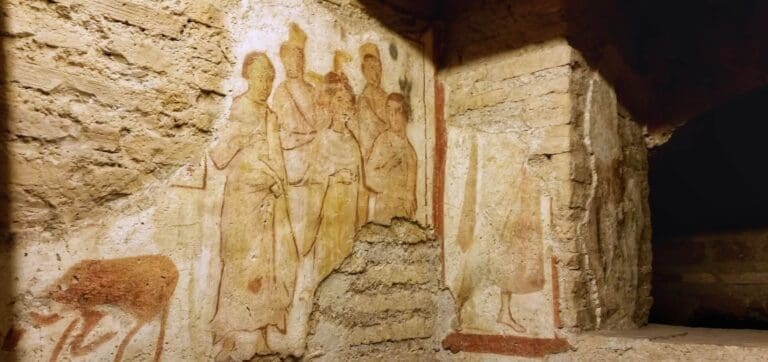 Wall frescoes in the catacombs of Domitilla in Rome
