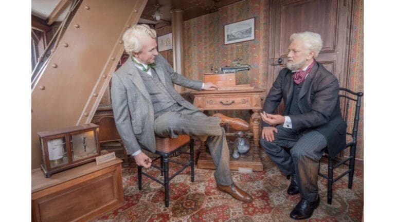 Monsieur Eiffel’s Old Apartment on the top floor of the Eiffel Tower with wax figures representing Eiffel and his guest Thomas Edison