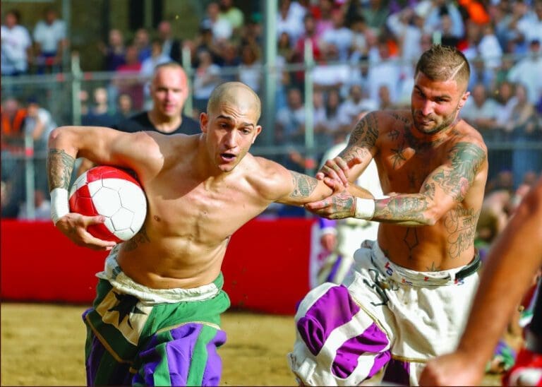 Calcio Storico in Florence, players jostle for the ball