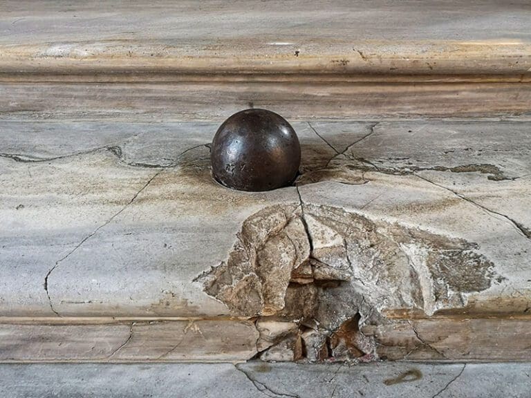 Cannon ball lodged in the marble steps of the Grand Hall of Palazzo Colonna