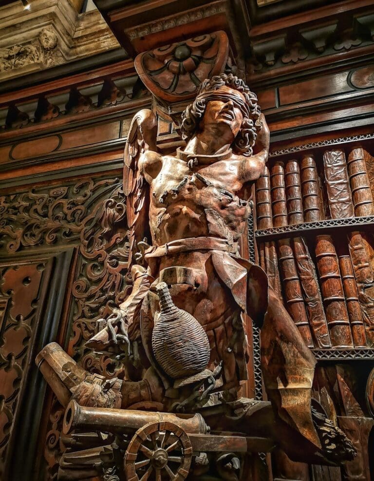 detail from the flagellant carvings in venice's san rocco