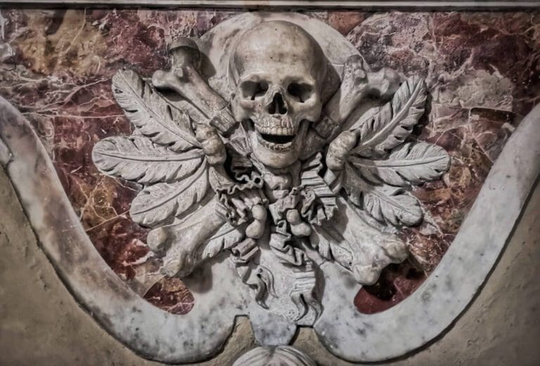 Aldobrandini funeral monument in the church of San Pietro in Vincoli Rome showing a winged skeleton with a scythe