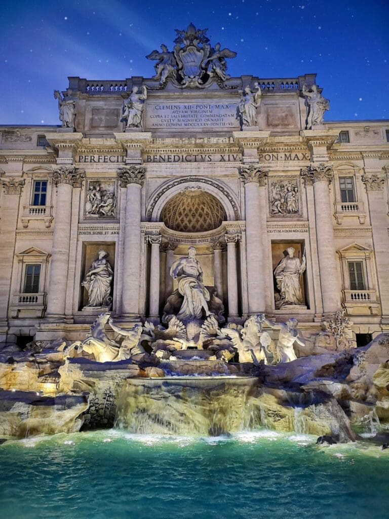 thre tevi fountain at night under the stars