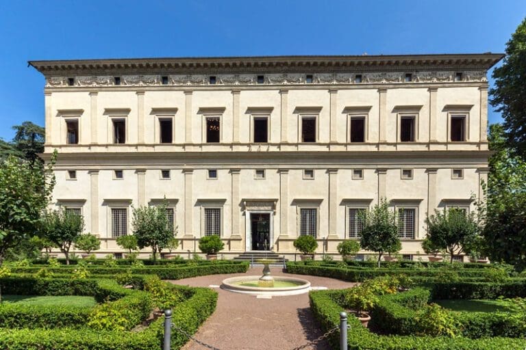 View of the facade of the Vila Farnesina in Rome withe gardens in the foreground