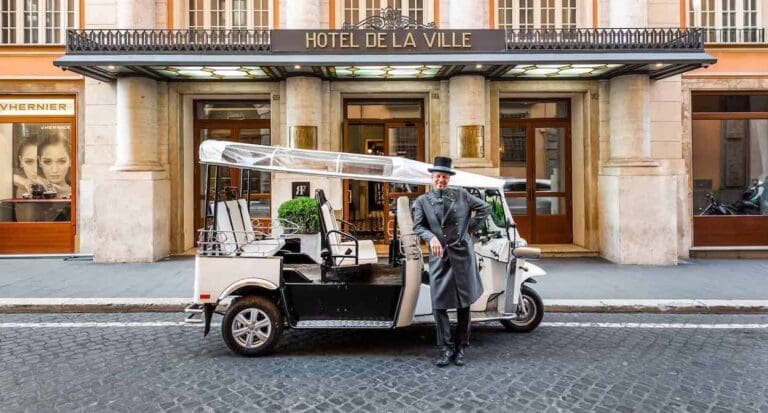 Through Eternity Tours Leading a Tuk Tuk Tour of Rome at the Hotel de La Ville