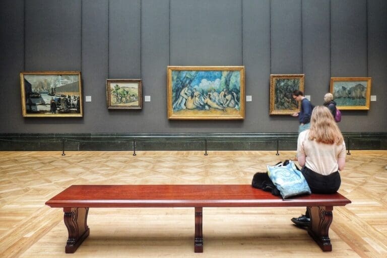 Girl sitting at a table inside the National Gallery