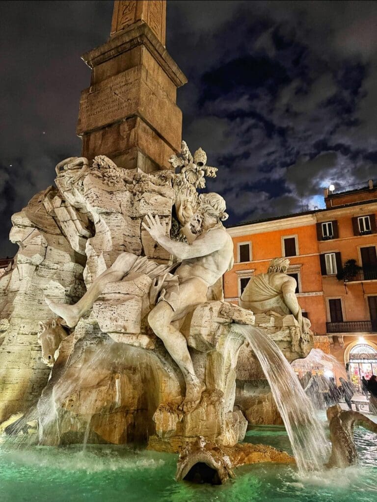 piazza navona's fountain of the four rivers at night