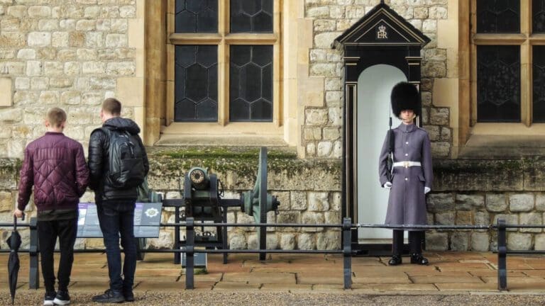 Ceremonial guards at the Tower of London gate.