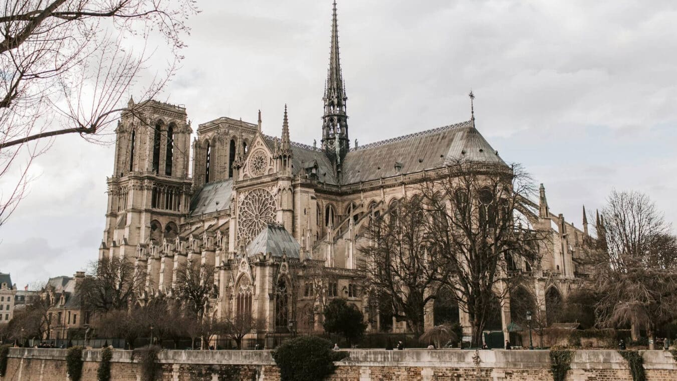 the Exterior of Notre Dame on a cloudy day